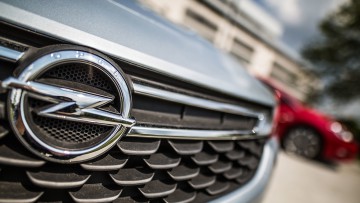 Übernahme: Millionen-Bonus für Opel-Manager?