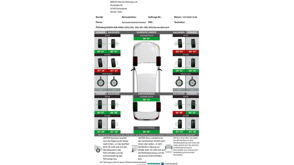 Ein Auto in einer Werkstatt zur Achsvermessung. 